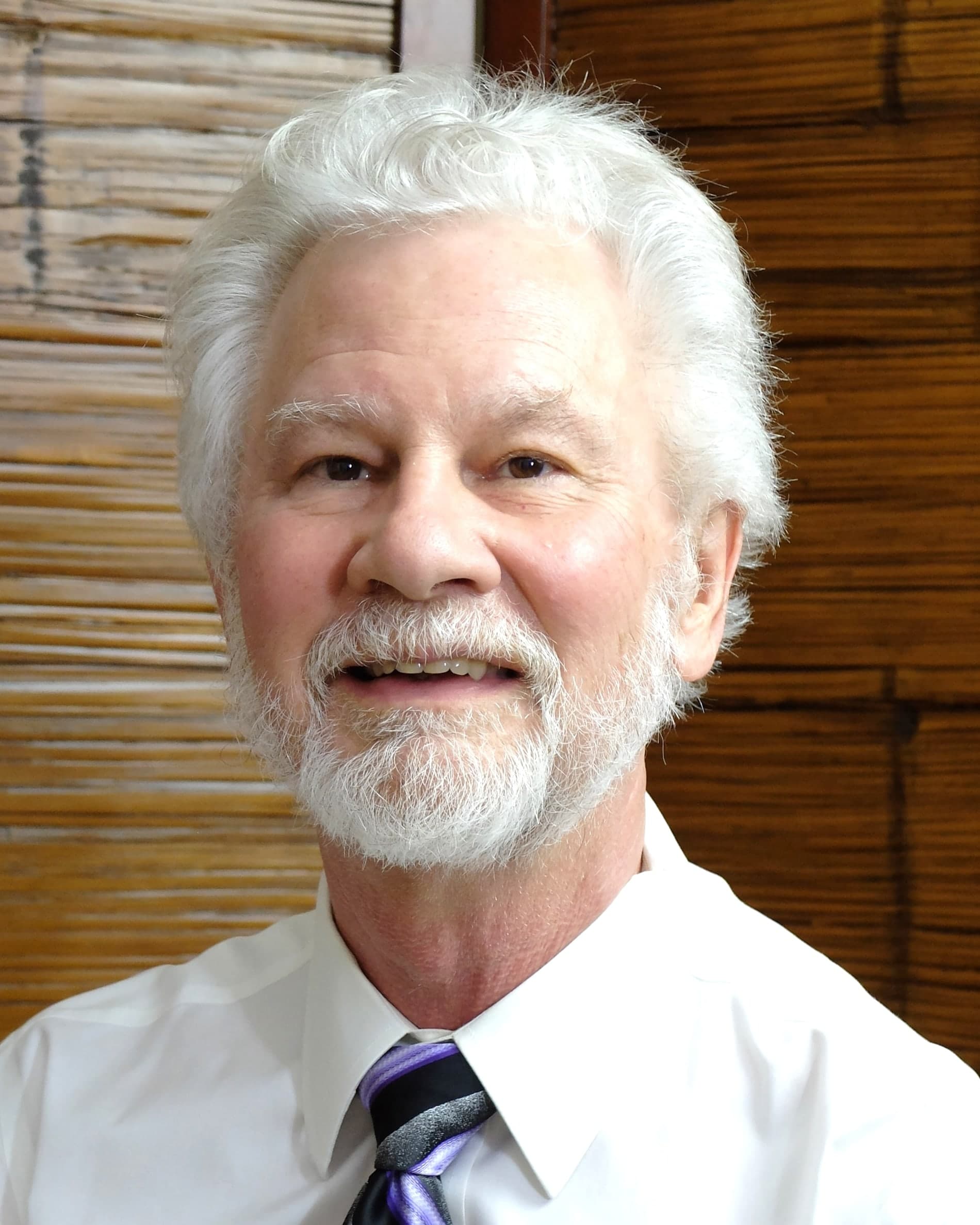 Head-and-shoulders portrait of the company’s founder.